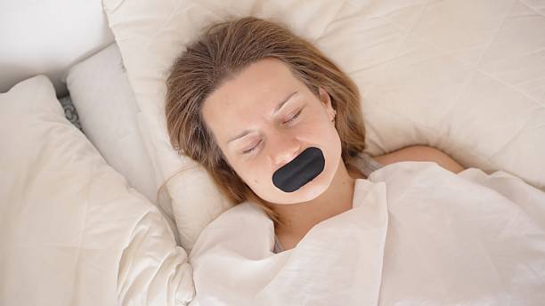 Preview Mouth Taping for Sleep Gains Popularity, Says CNN