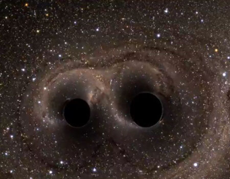 Astronomers Unveil First Direct Photo of Two Black Holes Orbiting Each Other