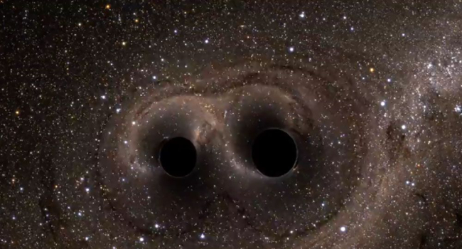 Preview Astronomers Unveil First Direct Photo of Two Black Holes Orbiting Each Other